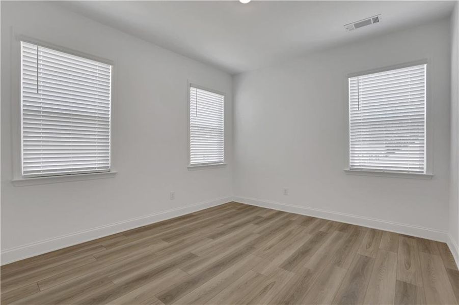 Spacious, unfurnished interior of a new home in Bailey Fence, Dacula (Image 32).