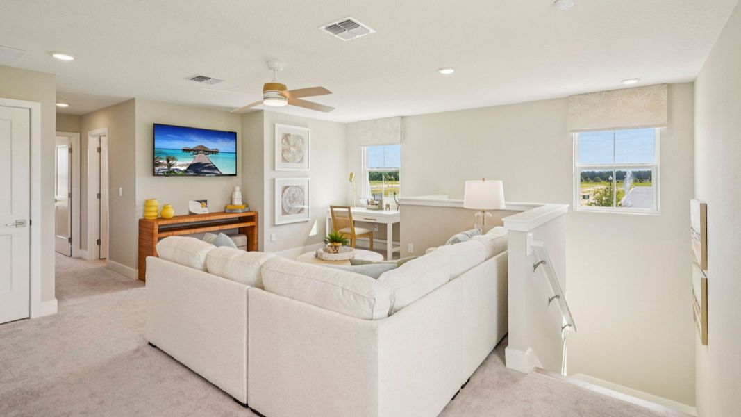 Representative furnished interior of a home built from the Sweetgum by DRB Homes in Ardisia Park, New Smyrna Beach (Image 46).