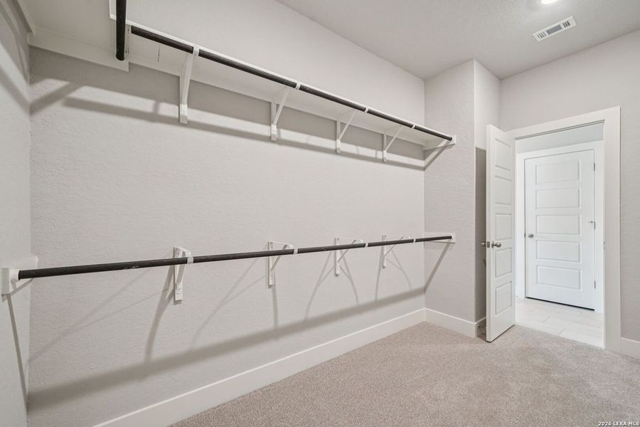 Spacious, unfurnished interior of a new home in Estancia Ranch - Classic Series, San Antonio (Image 29).