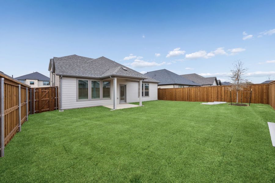 Covered Patio in the Stanley II home plan by Trophy Signature Homes – REPRESENTATIVE PHOTO Covered Patio in the Stanley II home plan by Trophy Signature Homes – REPRESENTATIVE PHOTO