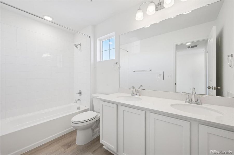 Furnished interior view inside a new home in The Aurora Highlands, Aurora (Image 10).