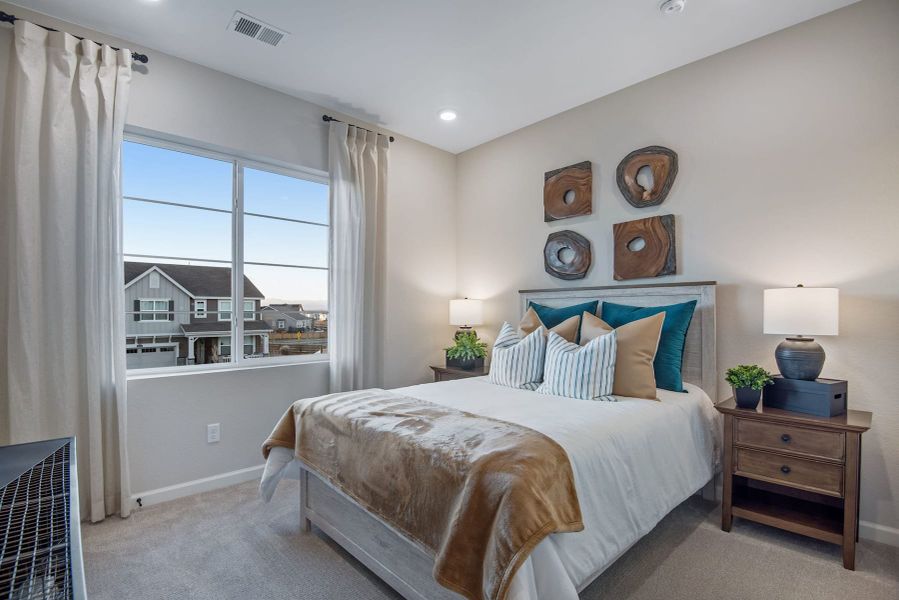 Furnished interior view inside a new home in Reunion, Commerce City (Image 17).