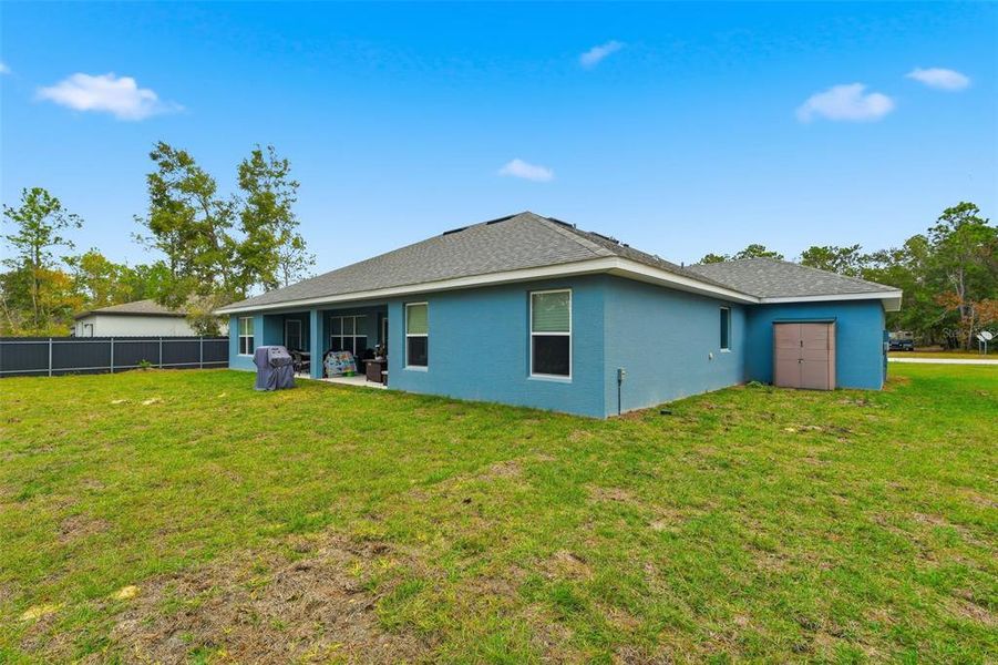 Exterior details and patio area of a home in Royal Highlands, Weeki Wachee (Image 32).