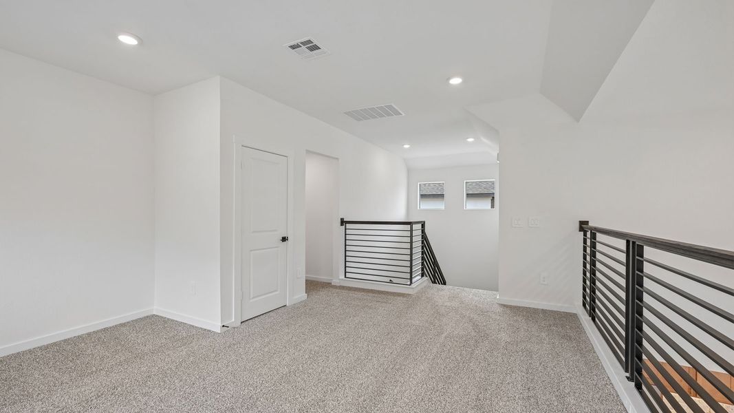 Spacious, unfurnished interior of a new home in The Enclave at Bar W Ranch, Leander (Image 29).