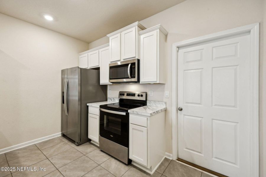 Furnished interior view inside a new home in , Yulee (Image 6).