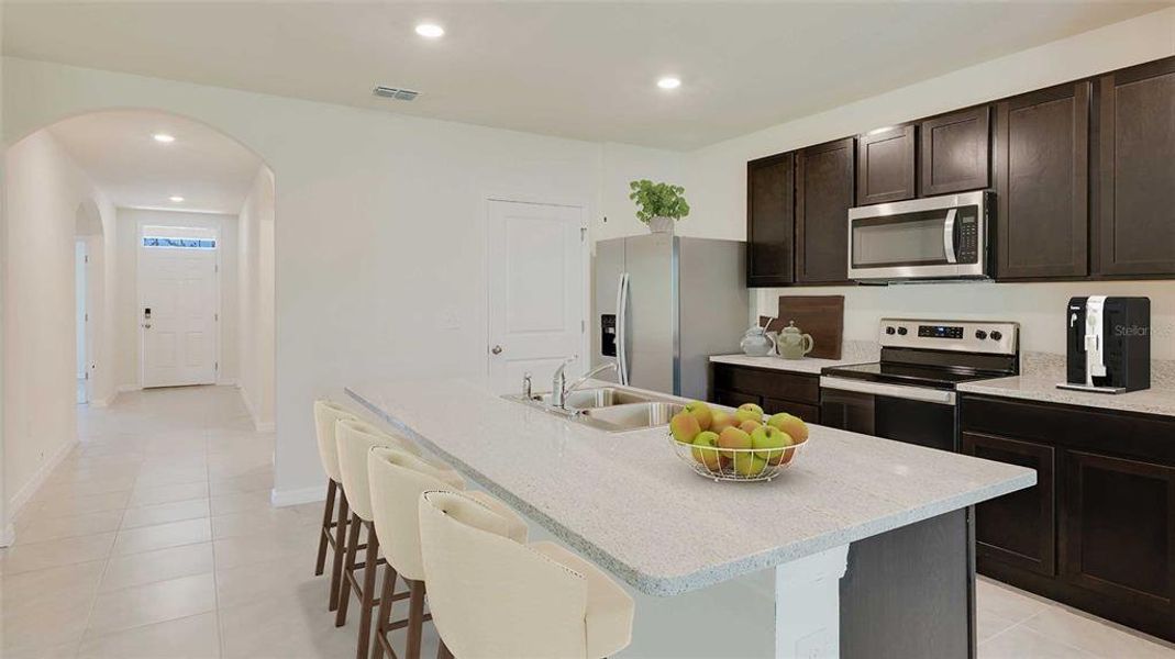 Furnished interior view inside a new home in Triumph South, Wildwood (Image 3).