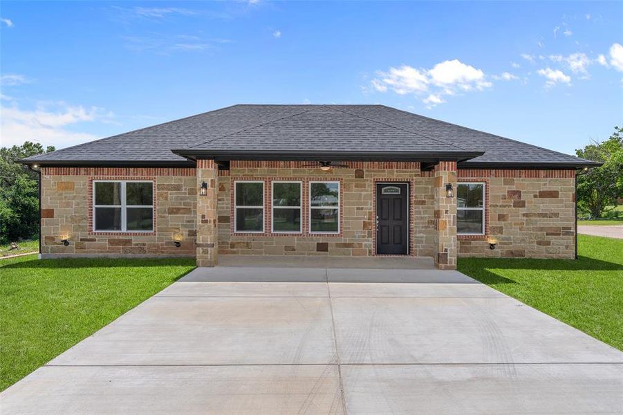 Front exterior of a new home in , Granbury, TX, highlighting curb appeal (Image 24).