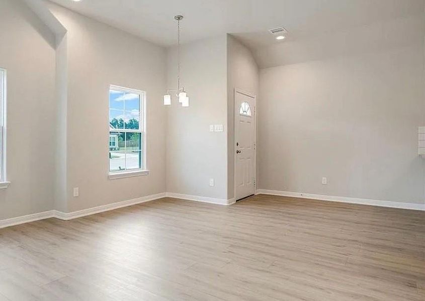 Spacious, unfurnished interior of a new home in East Gate Villas, Willis (Image 4).