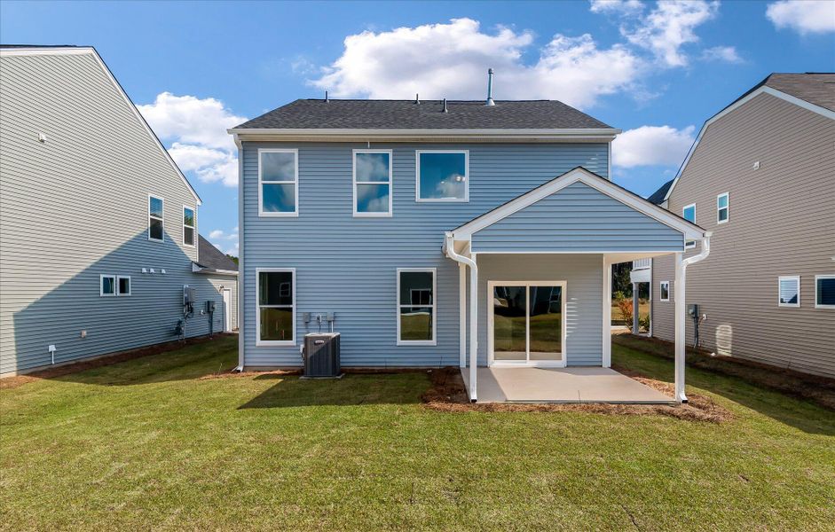 Exterior details and patio area of a home in Oakley Pointe, Moncks Corner (Image 24).
