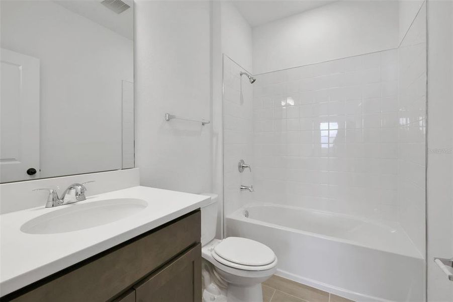 Furnished interior view inside a new home in Serenade at Ovation, Winter Garden (Image 9). Furnished interior view inside a new home in Serenade at Ovation, Winter Garden (Image 9).