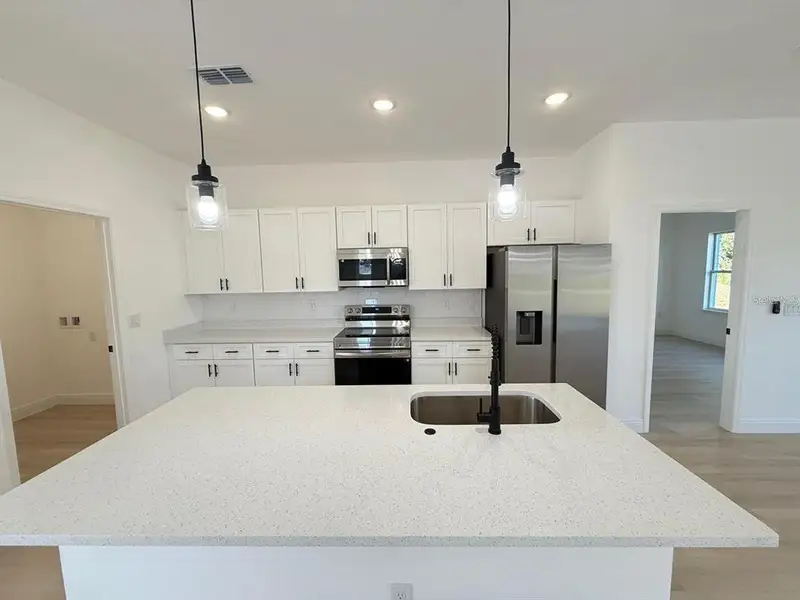 Furnished interior view inside a new home in , Ocala (Image 5).