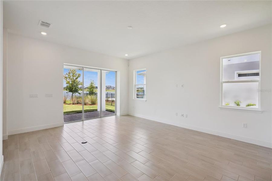 Spacious, unfurnished interior of a new home in Laureate Park, Orlando (Image 37).