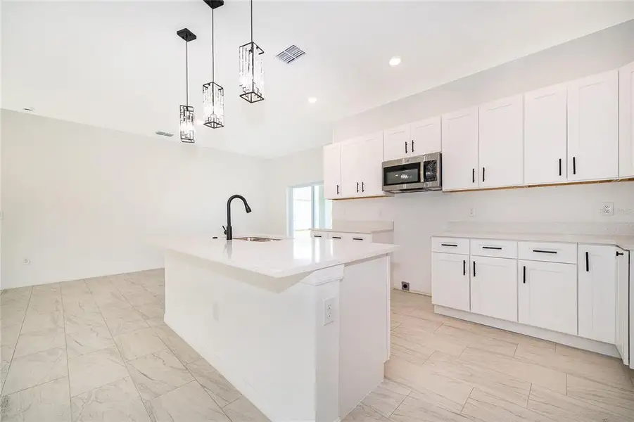 Furnished interior view inside a new home in , Kissimmee (Image 10).