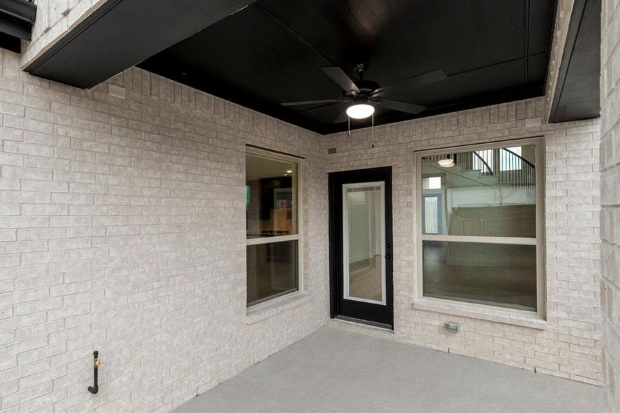 Exterior details and patio area of a home in Trails at Cottonwood Creek, Rowlett (Image 3).