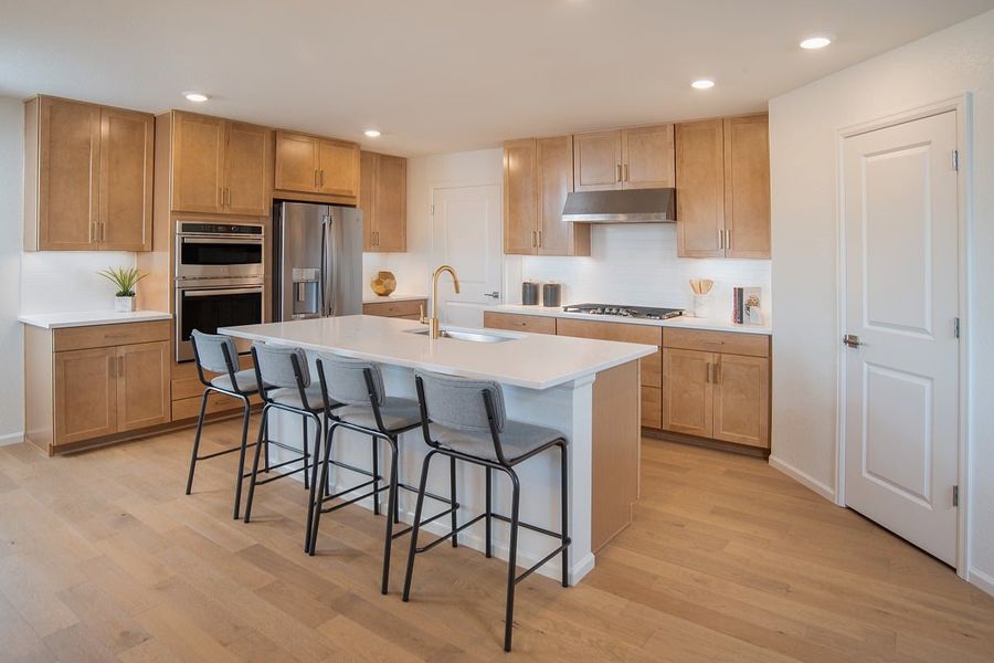 Representative furnished interior of a home built from the 2502 by KB Home in Legato, Commerce City (Image 4).