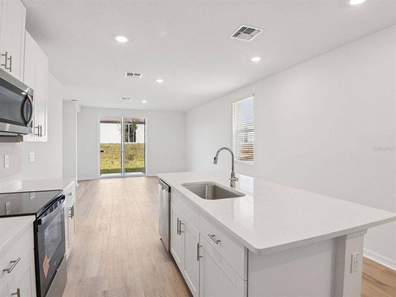 Furnished interior view inside a new home in Salt Meadows - Premier Series, Parrish (Image 8).