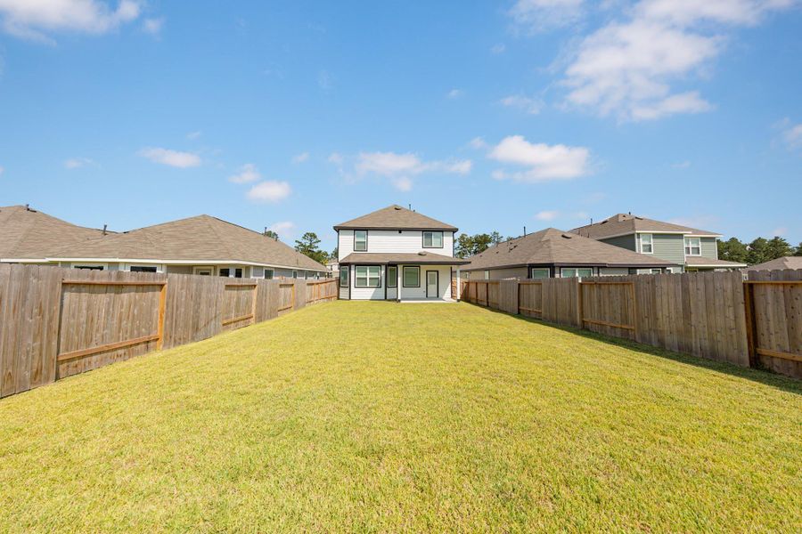 Exterior details and patio area of a home in Townsend Reserve, Splendora (Image 2). Exterior details and patio area of a home in Townsend Reserve, Splendora (Image 2).