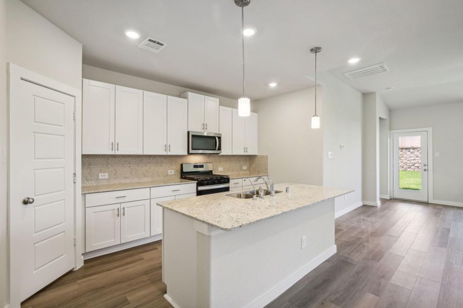 Photo is not of the actual home, but is an inspirational photo of builder’s model home and may depict options, furnishings, and/or decorator features that are not included