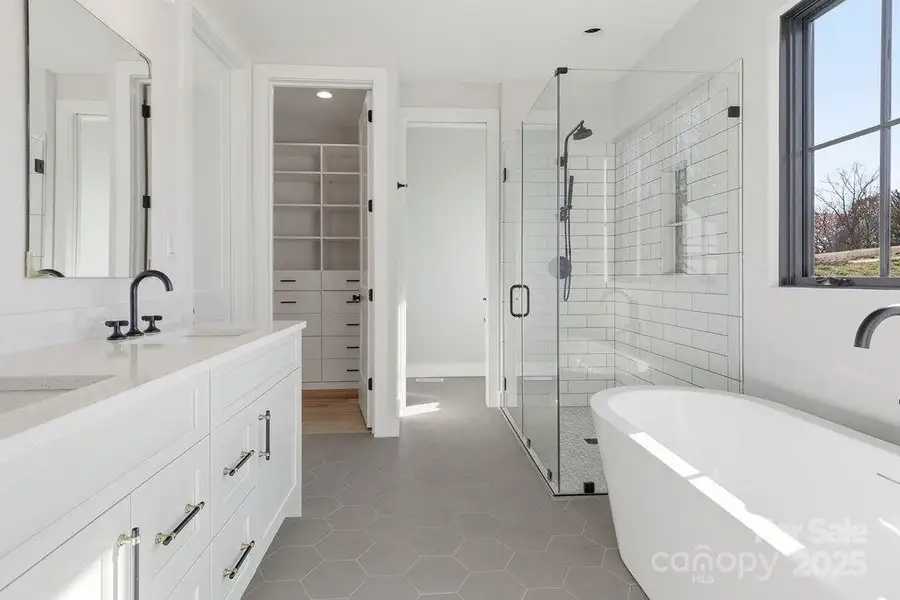 Luxury primary bath with elevated fixtures
