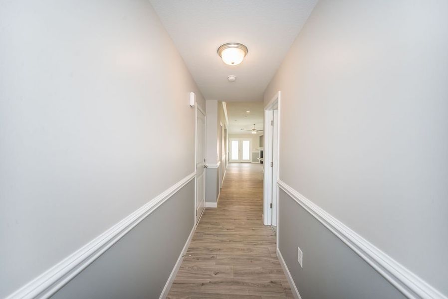 Representative unfurnished interior of a home built from the Quincy by Enchanted Homes in Hampshire Heights, Moore (Image 20).