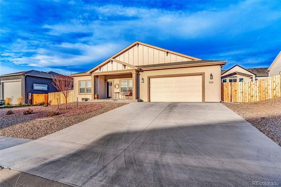 Front exterior of a new home in , Cañon City, CO, highlighting curb appeal (Image 2). Front exterior of a new home in , Cañon City, CO, highlighting curb appeal (Image 2).
