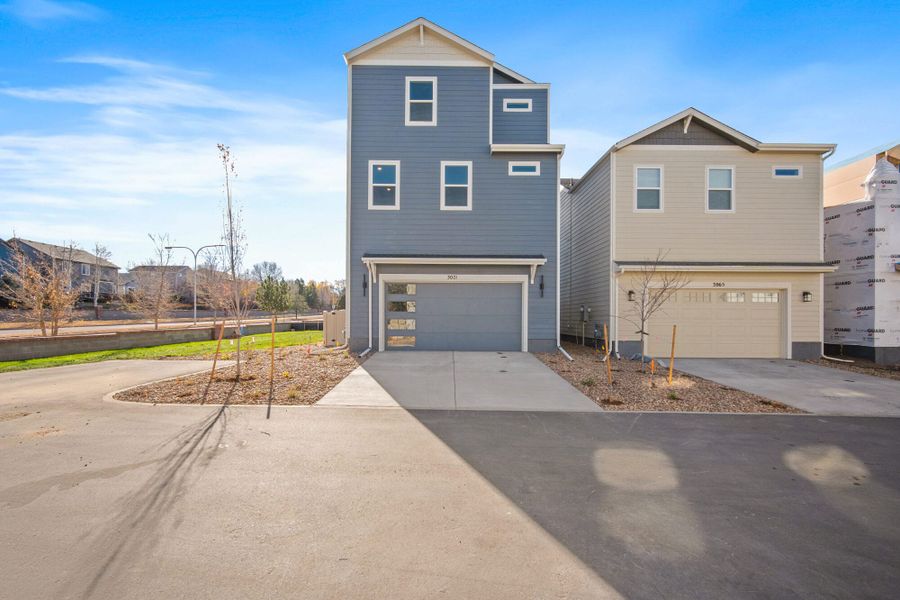 Front exterior of a new home in Pony Park, Colorado Springs, CO, highlighting curb appeal (Image 2). Front exterior of a new home in Pony Park, Colorado Springs, CO, highlighting curb appeal (Image 2).