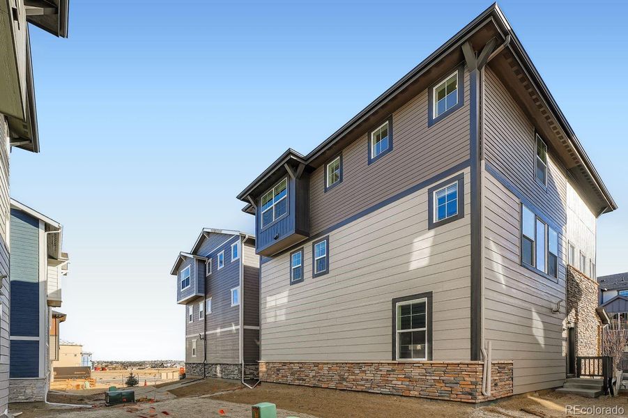 Exterior details and patio area of a home in Parterre: The Skyline Collection, Thornton (Image 2).