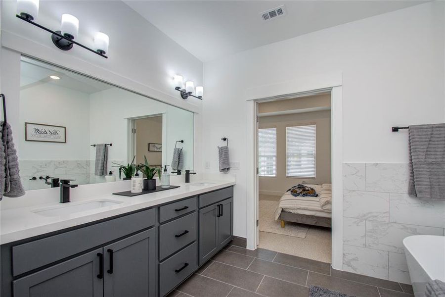 Primary bathroom! Model home photos - FINISHES AND LAYOUT MAY VARY!