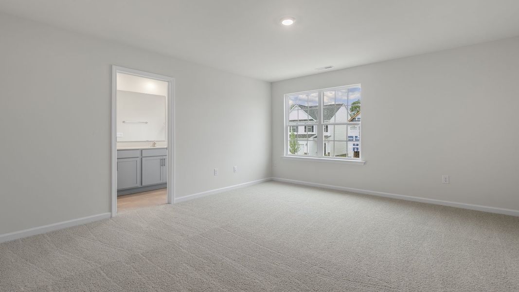 Spacious, unfurnished interior of a new home in The Grove at Matthews Landing, Fuquay Varina (Image 24).