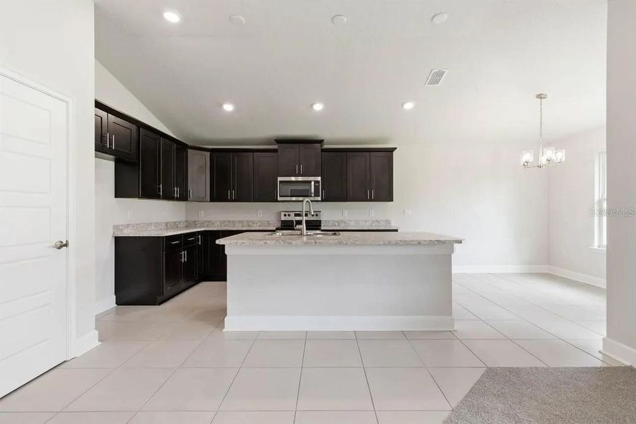 Representative furnished interior of a home built from the 1512 by Adams Homes in Winding Oaks, Weeki Wachee (Image 8).