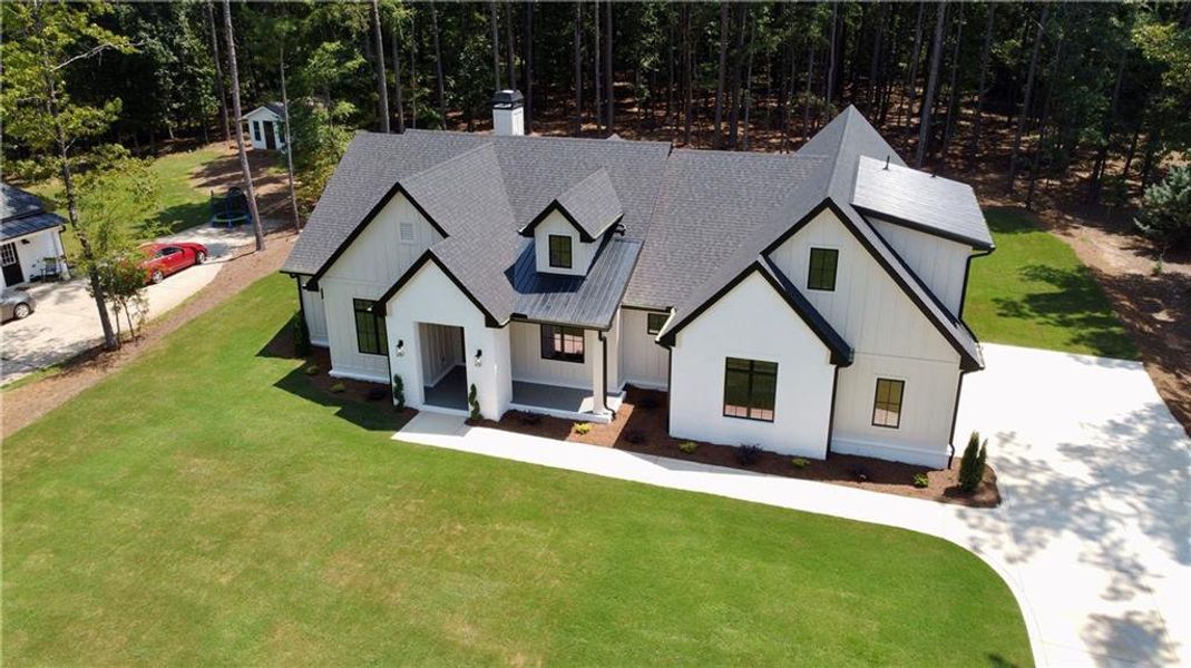 Front exterior of a new home in , Eatonton, GA, highlighting curb appeal (Image 18).