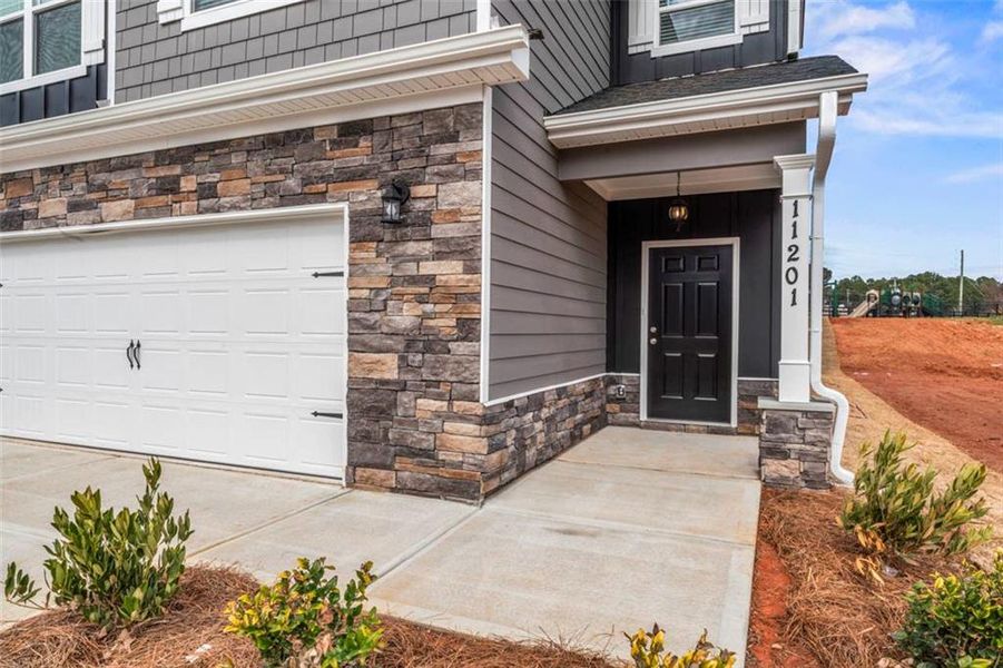 Exterior details and patio area of a home in , Hampton (Image 3).