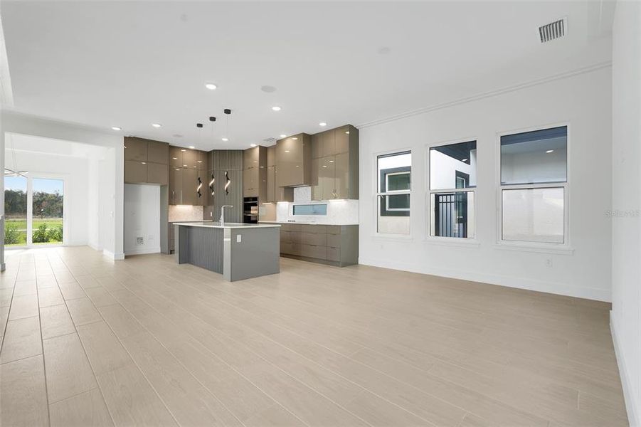 Furnished interior view inside a new home in Hampton Green at Providence, Davenport (Image 13).