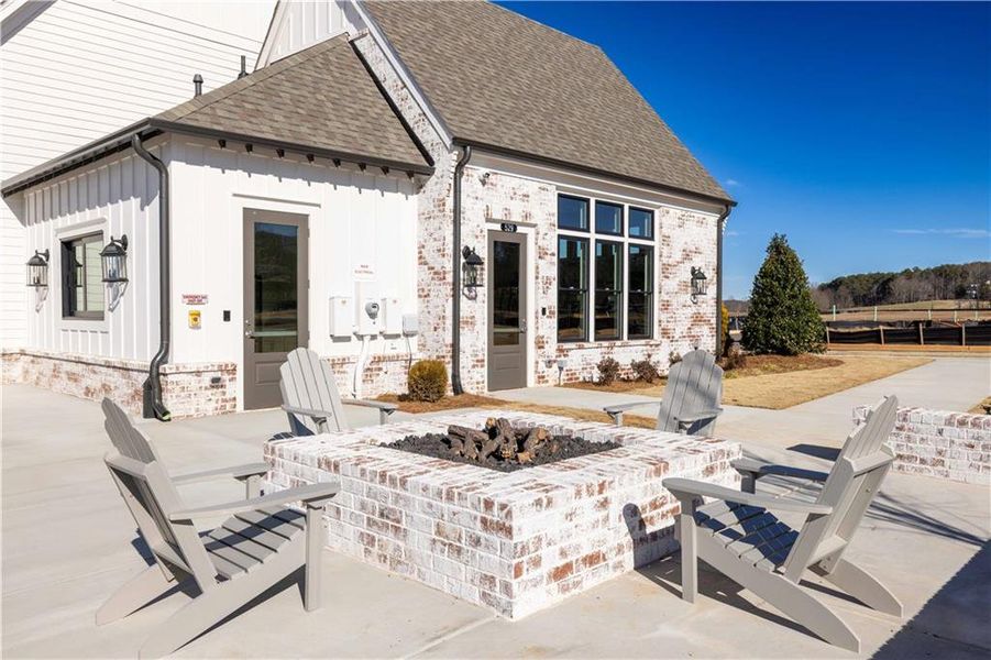 Front exterior of a new home in Promenade at Sawnee Village, Cumming, GA, highlighting curb appeal (Image 26).