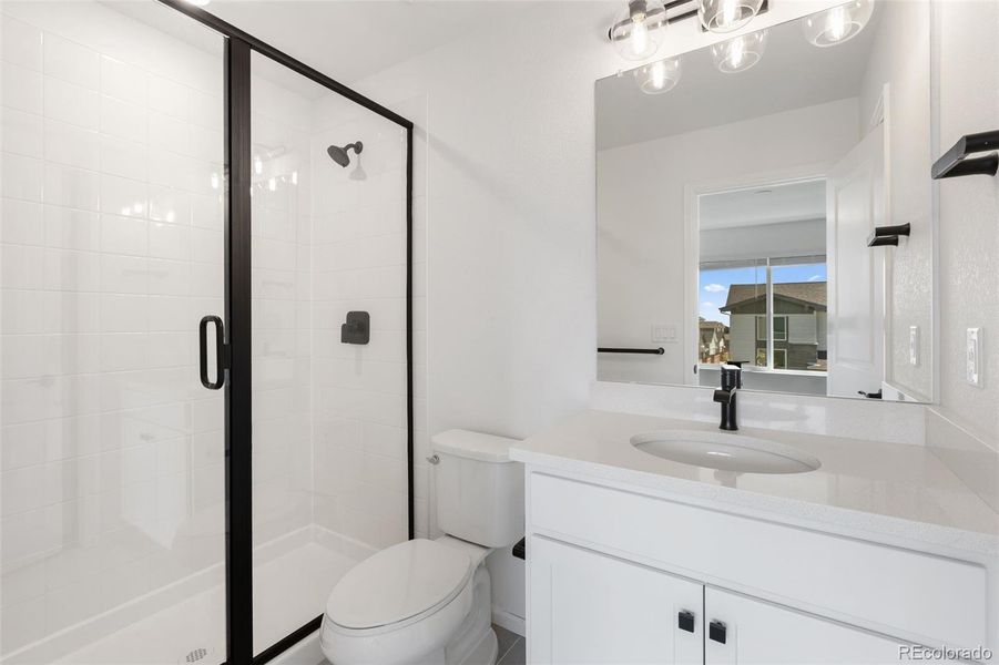 Furnished interior view inside a new home in Woodrose at Painted Prairie, Aurora (Image 8).