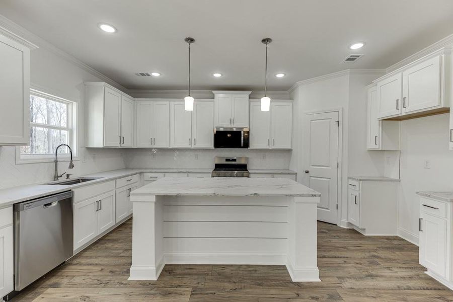 Furnished interior view inside a new home in , Commerce (Image 12).