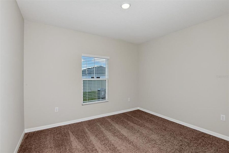 Spacious, unfurnished interior of a new home in Pasadena Landing, Wesley Chapel (Image 14).