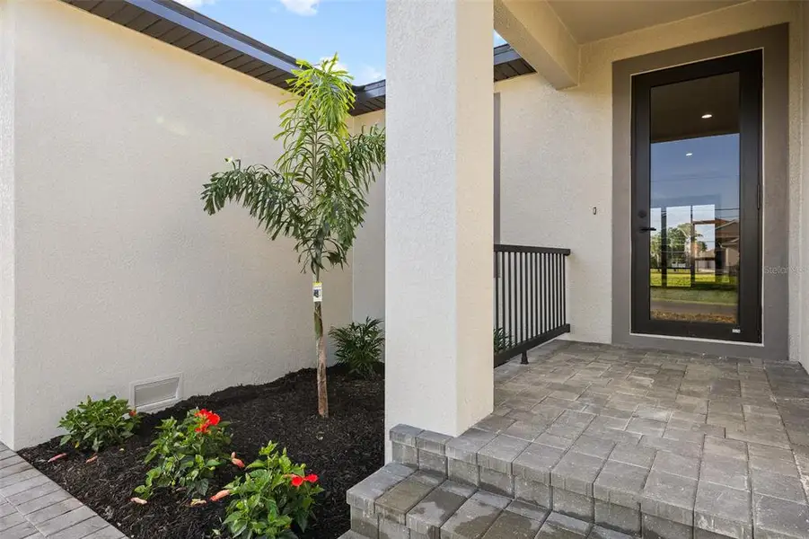 Exterior details and patio area of a home in , Rotonda West (Image 28).