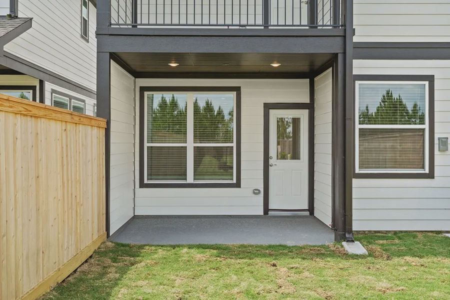 Exterior details and patio area of a home in Bridgeland Chateaus, Cypress (Image 21).