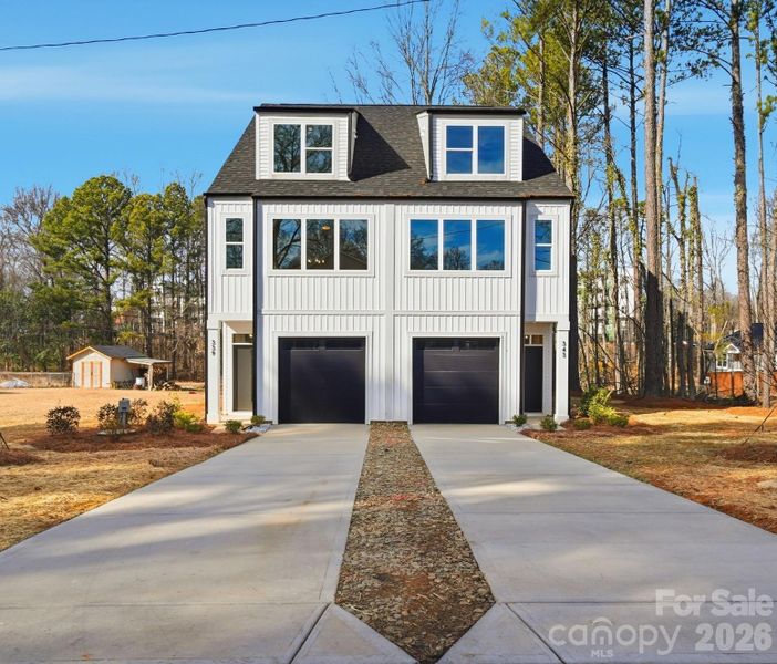 Front exterior of a new home in , Charlotte, NC, highlighting curb appeal (Image 1). Front exterior of a new home in , Charlotte, NC, highlighting curb appeal (Image 1).