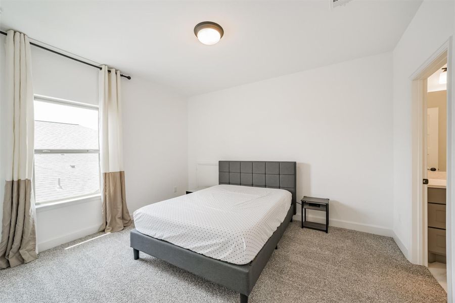 The fifth upstairs bedroom features convenient access to the bathroom. The fifth upstairs bedroom features convenient access to the bathroom.