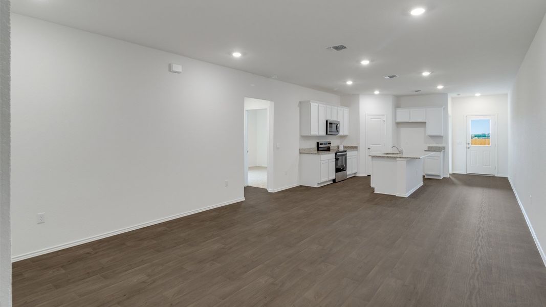 Representative unfurnished interior of a home built from the The Magnolia by D.R. Horton in Palomino, Manor (Image 6).