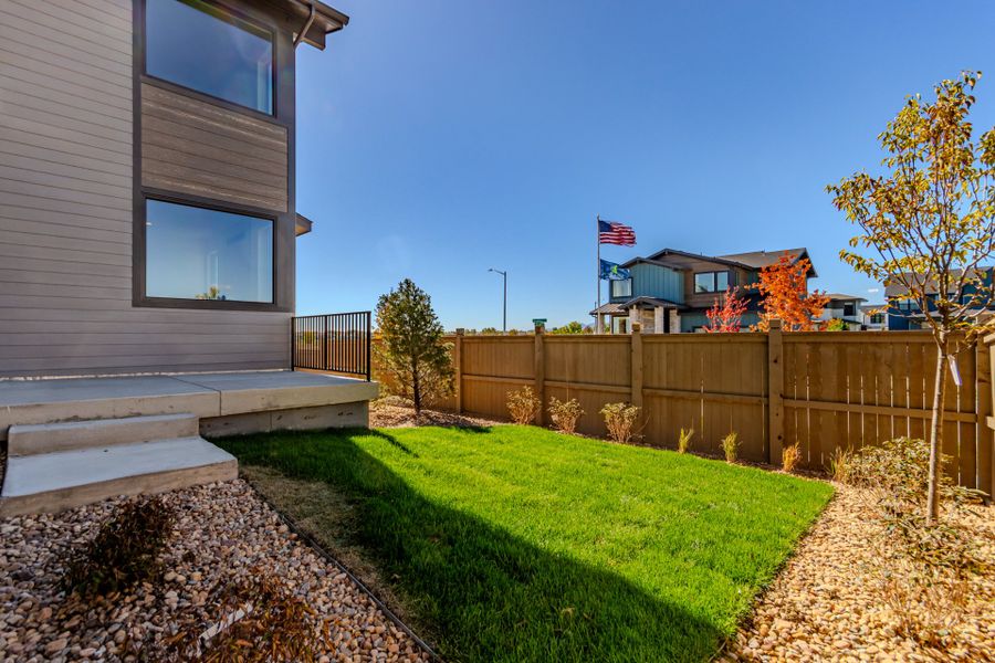 Exterior details and patio area of a home in West Grange, Longmont (Image 26).