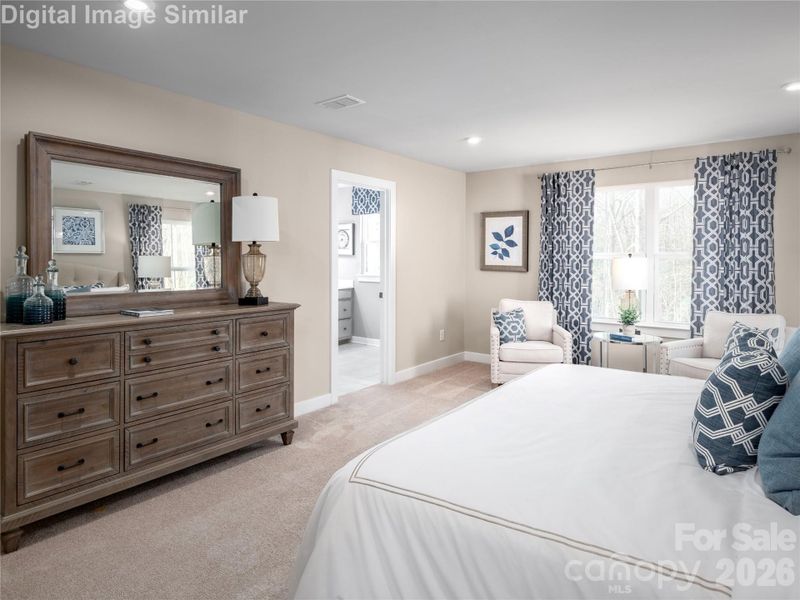 Plenty of room to relax and recharge — this bedroom offers space to move, unwind, and make it your own.