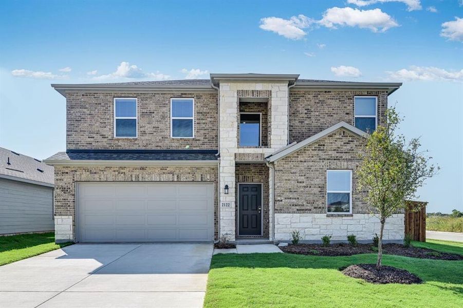 Front exterior of a new home in River Ridge, Crandall, TX, highlighting curb appeal (Image 1). Front exterior of a new home in River Ridge, Crandall, TX, highlighting curb appeal (Image 1).