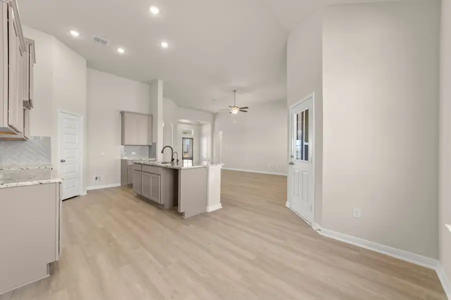 Furnished interior view inside a new home in Villas Las Flores, Floresville (Image 10).