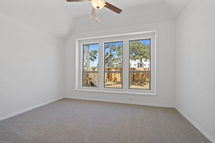 Primary Bedroom with elevated ceiling Primary Bedroom with elevated ceiling