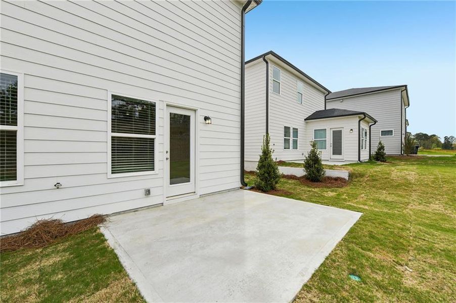 Exterior details and patio area of a home in Hawthorne Station, College Park (Image 3). Exterior details and patio area of a home in Hawthorne Station, College Park (Image 3).