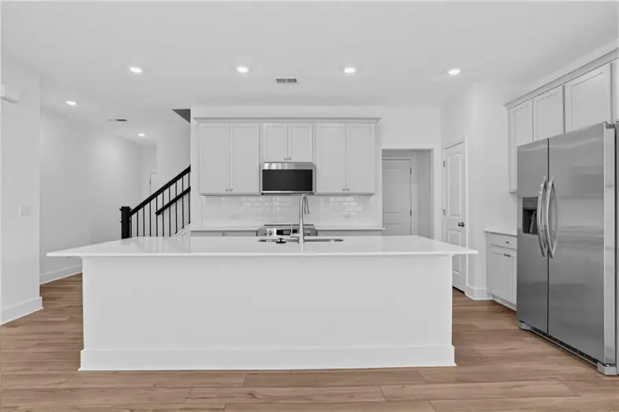 Furnished interior view inside a new home in Towns at Holly Springs, Holly Springs (Image 6).