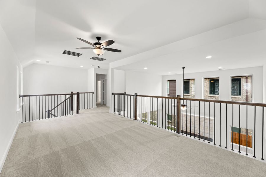 Representative unfurnished interior of a home built from the Willow by UnionMain Homes in Edgewater, Fate (Image 22).